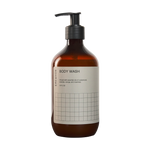 A bottle of Erewhon Body Wash with a pump dispenser. The label shows the brand name and the words 'BODY WASH' in bold, and a grid pattern.