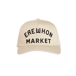 A cream-colored baseball cap with 'EREWHON MARKET' text embroidered on the front.