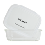 Clear glass Erewhon food storage containers in small, with a white lid, the brand name is visible on the lid.