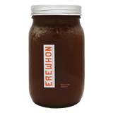 Erewhon Organic Beef Bone Broth glass jar with a white lid and 'Erewhon' label on a white background