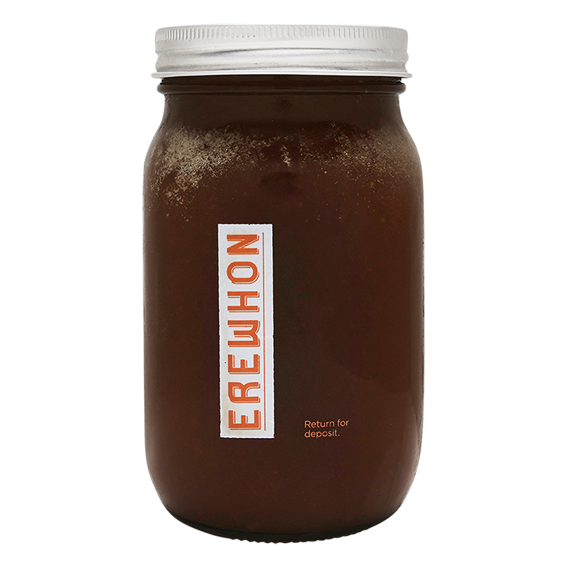 Erewhon Organic Beef Bone Broth glass jar with a white lid and 'Erewhon' label on a white background