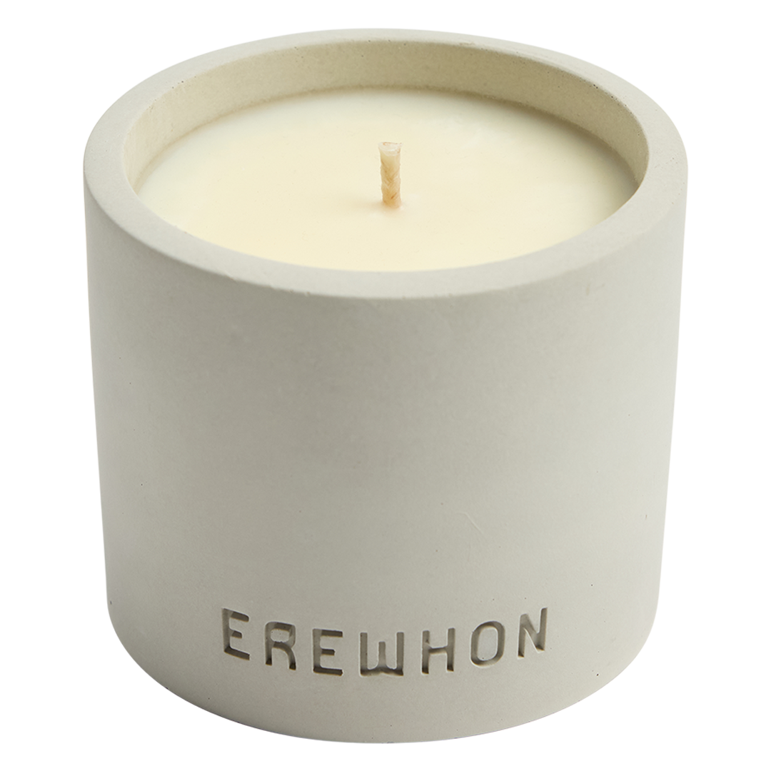 Erewhon Anise Mint Candle in a concrete holder with 'Erewhon' branding on a white background