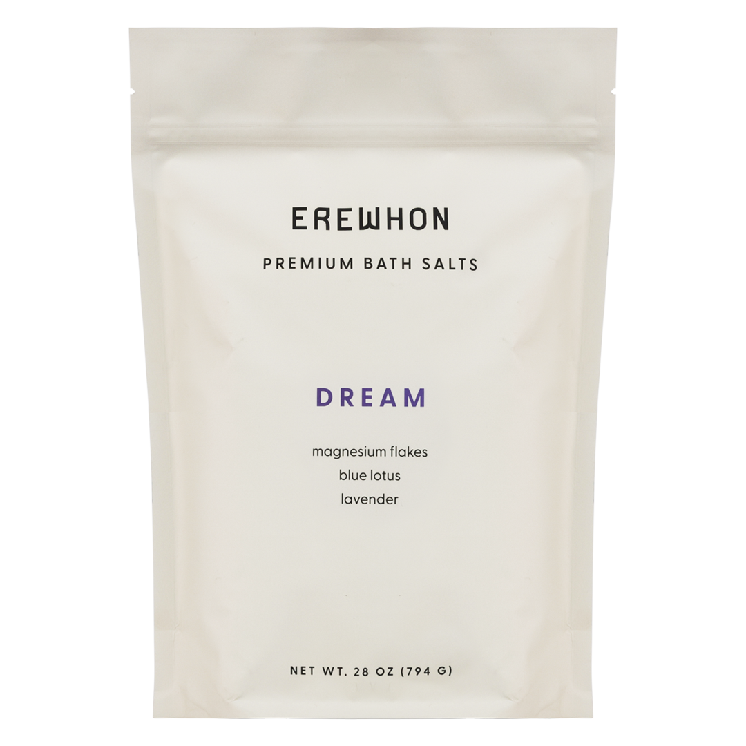 A package of Erewhon Premium Bath Salts in the Uplift variant, featuring magnesium flakes with rose geranium and bergamot.