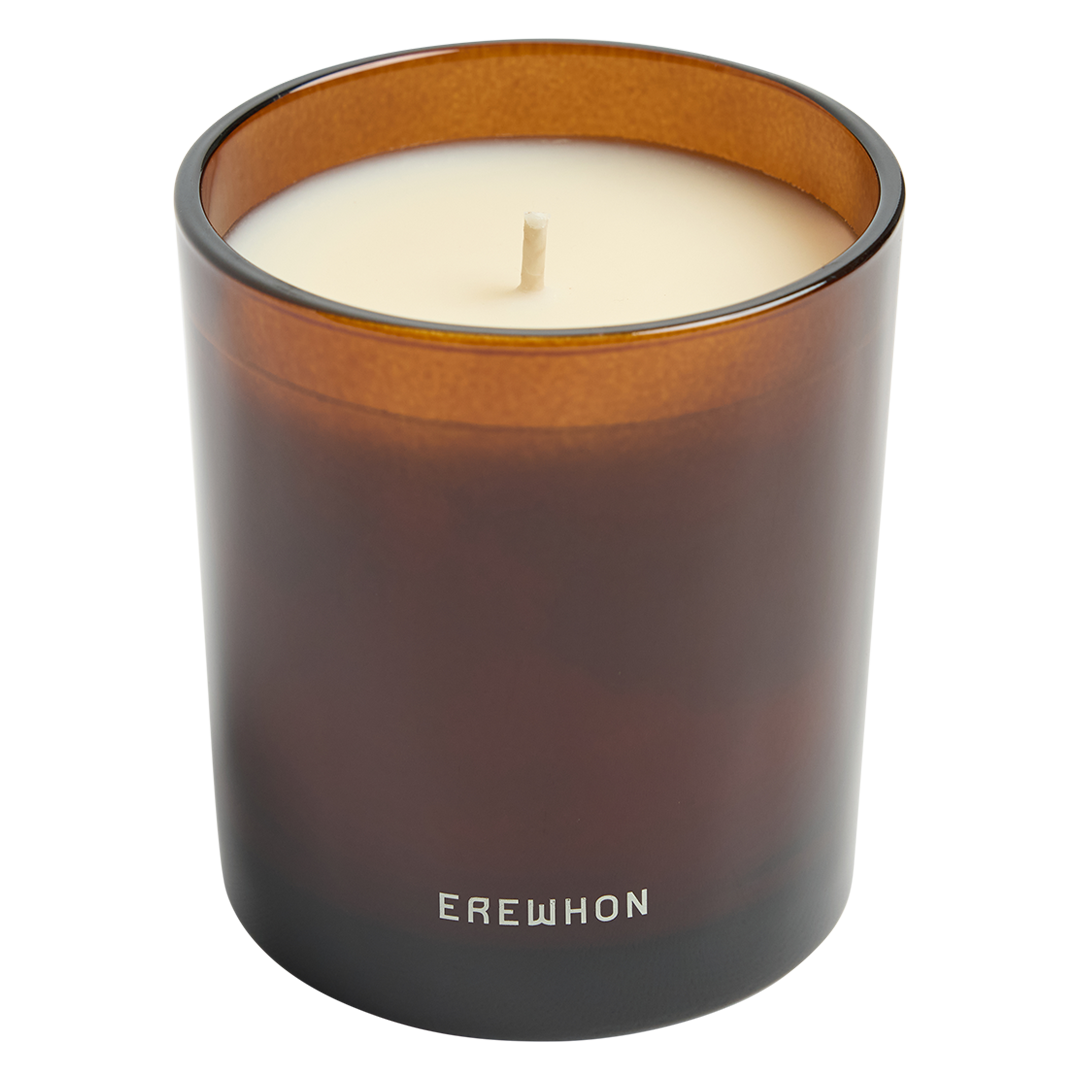 Erewhon Smoked Oud & Frankincense in a brown glass container with 'Erewhon' branding on a white background