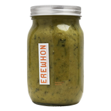 Organic Mighty Greens Soup Jar of green spread with a silver lid on a white background