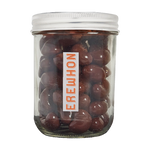 EREWHON jar of Milk Chocolate Covered Cashews with a white lid and 'EREWHON' label on a white background
