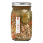 Erewhon Organic Chicken Vegetable Soup Jar of soup with visible ingredients and a brand label on a white background