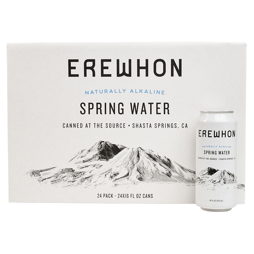A 24-pack of Erewhon Spring Water in 16 oz eco-friendly recycled aluminum cans, with packaging featuring an image of Mount Shasta.