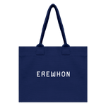 Limited-edition Erewhon Traveler Bag in blue, organic cotton tote, eco-friendly 15x18x9 inches with 9-inch handle, ideal for daily use and travel