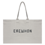 Erewhon Weekender Bag XL in Natural, 15" x 25" x 9", made from 100% organic cotton with eco-friendly dyes, featuring durable handles and minimalist black print.