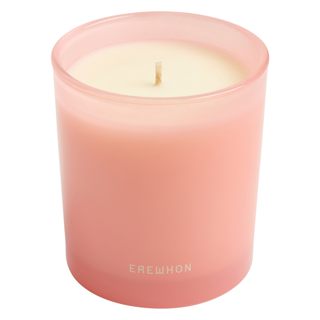 WHITE ROSE BERGAMONT Pink candle with 'Erewhon' branding on a white background